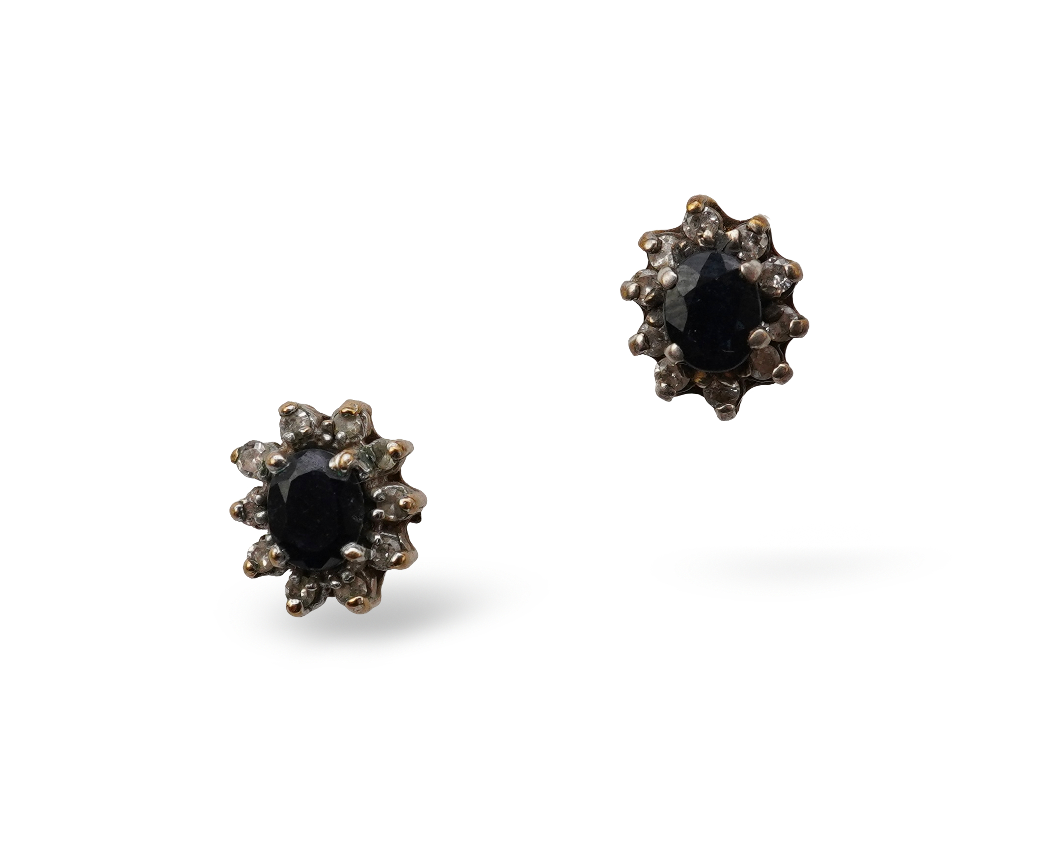 A pair of sapphire and diamond stud earrings, of cluster design, mounted in gold, length 0.9cm each